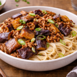 Nouilles sautées au porc et aubergines fondantes à l'autocuiseur cookéo