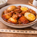Porc fondant caramélisé et œufs au cookéo