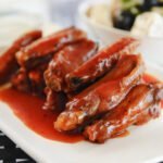 Ailes de poulet sauce tomate au cookéo
